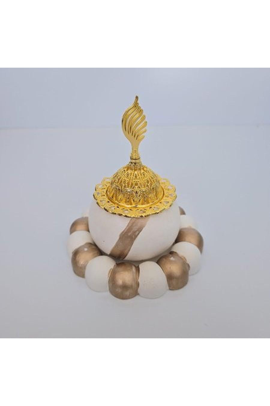 White and brown incense burner