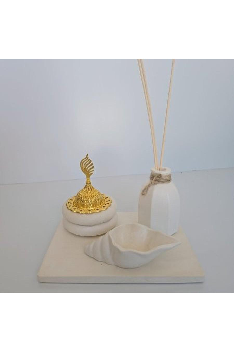 White with incense burner and shell