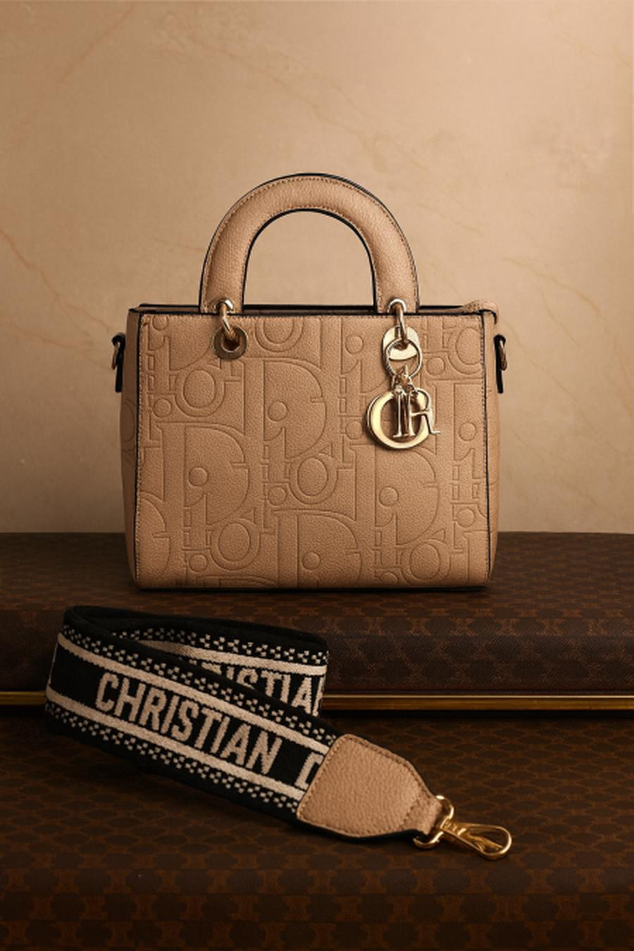 Lady Dior bag, engraved leather, base 25 cm