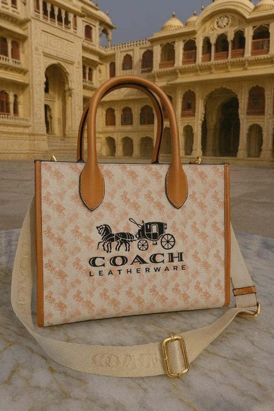 Coach bag, base 34 cm, height 27 cm